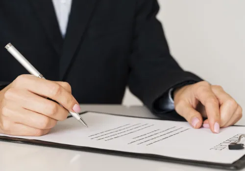 person-signing-certificate-front-view